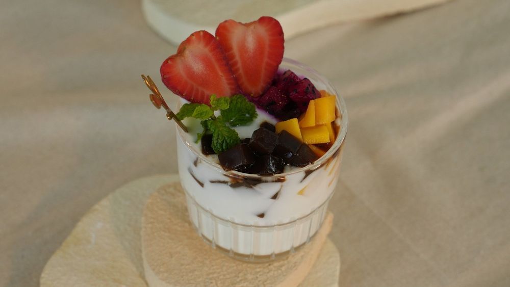 Coconut jelly with chia seeds and fresh fruit is a quick, delicious treat for the whole family.