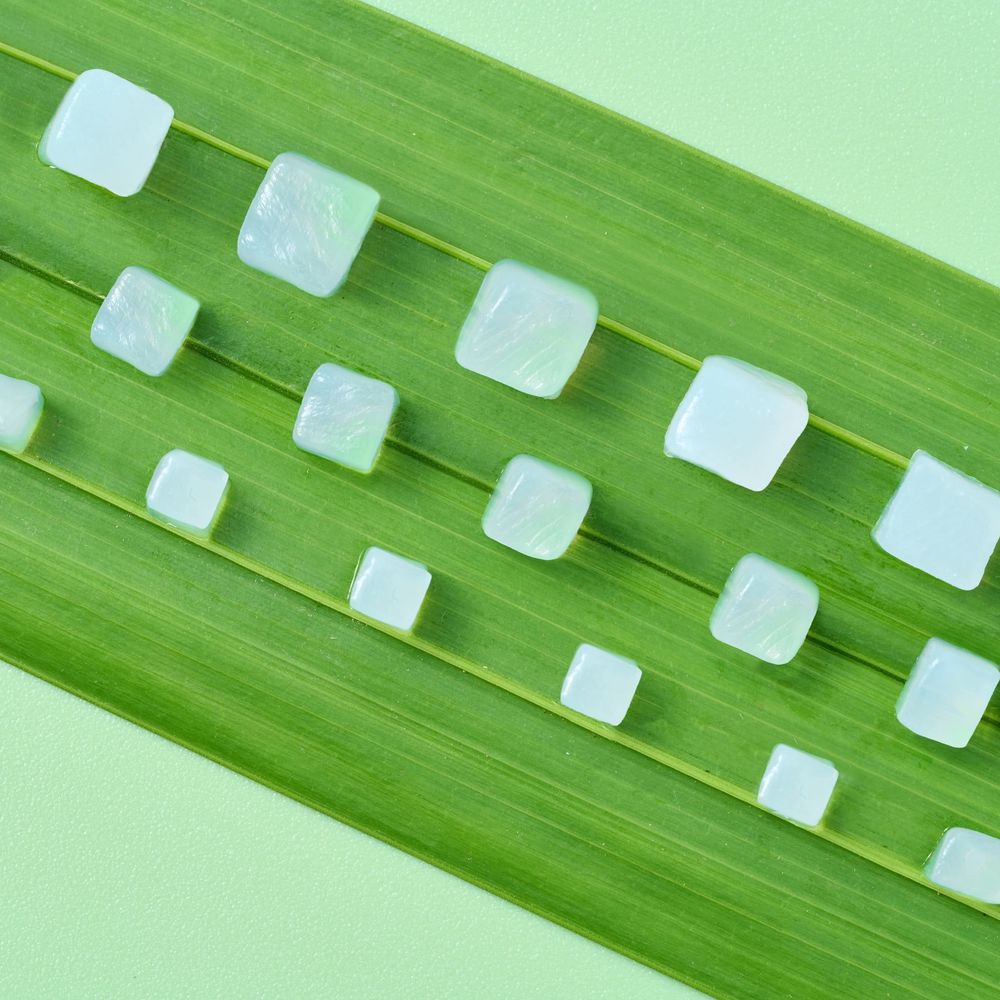 When the jelly block meets the right standard, workers wash it thoroughly, cut it into evenly sized squares, and then simmer it with sugar for flavor before starting the sterilization process.