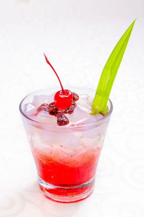 The tasty combo of jasmine tea and raspberry jam with chewy shredded coconut jelly makes a homemade drink that’s just right.
